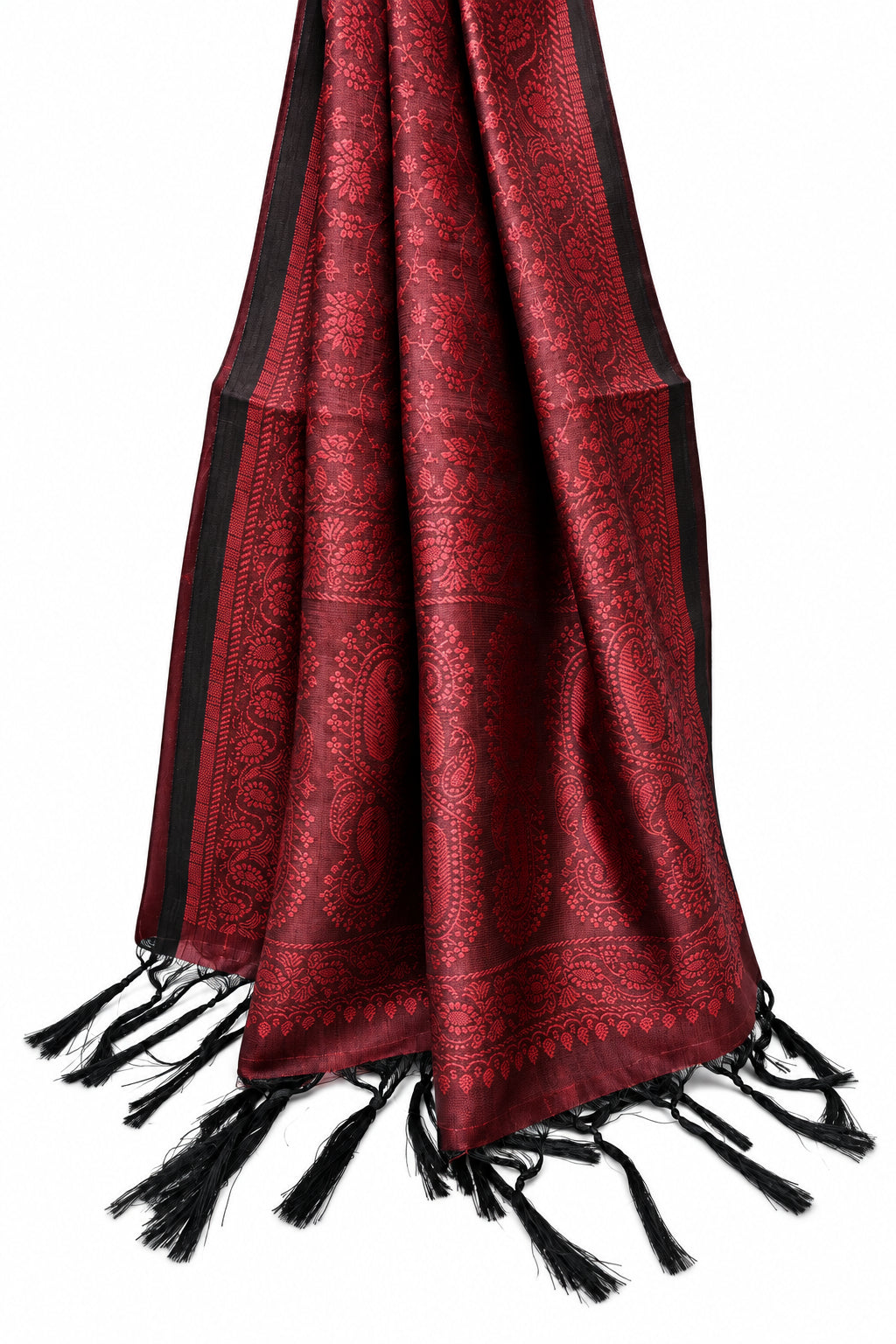 A red and black patterned shawl with black tassels, draped against a solid white background.
