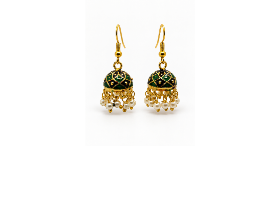 A pair of gold-plated jhumka earrings with green and black enamel detailing on the dome-shaped charms and dangling white pearl beads, shown on a plain white background.